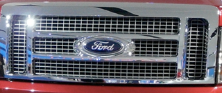 Illustration for article titled Detroit Auto Show: 2009 Dodge Ram Versus 2009 Ford F-150